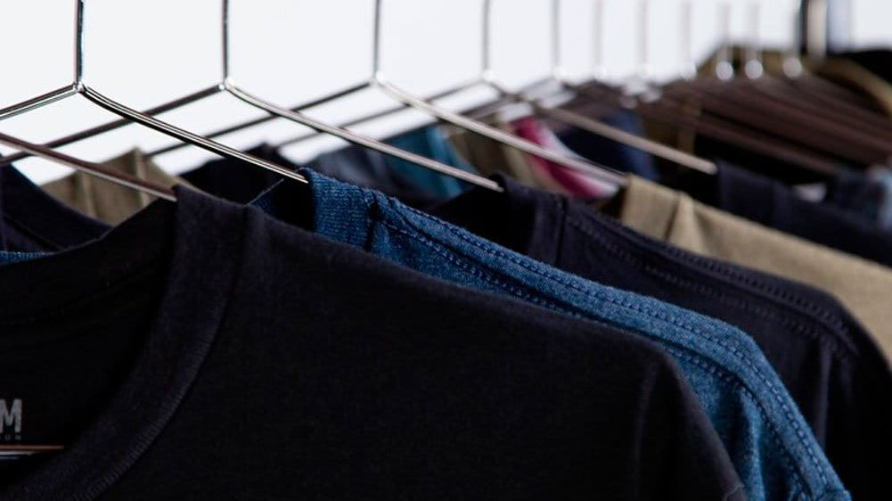 INTO THE AM Tee Club graphic tees laid out together, a monthly graphic tee subscription that makes an easy gift